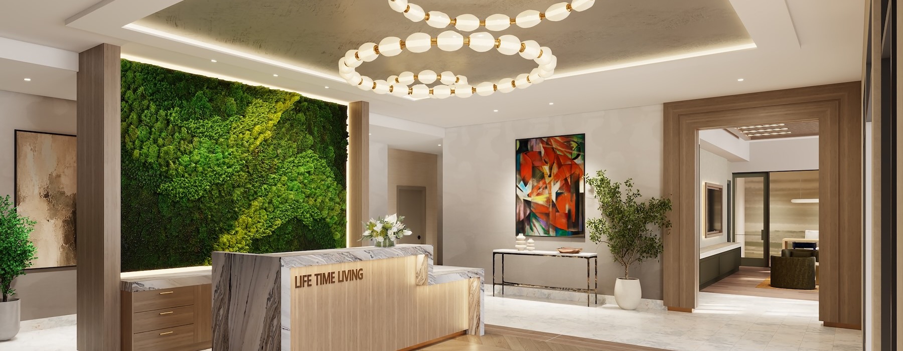 a front desk area with a greenery wall