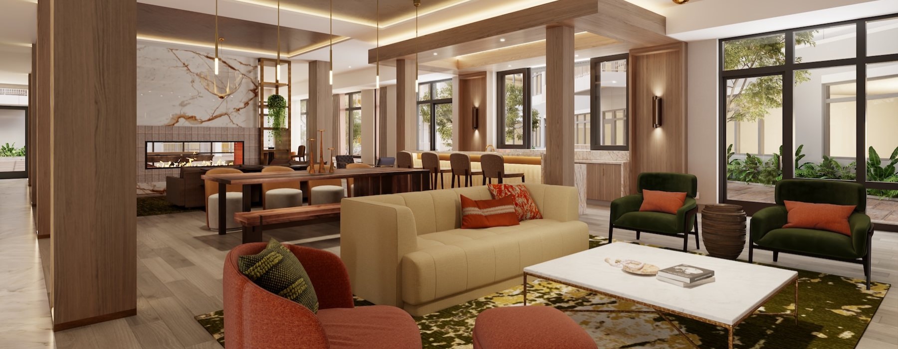 a clubroom with a couch, table and chairs